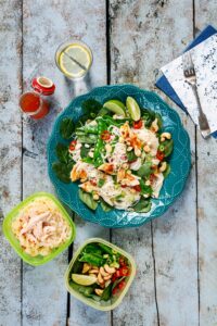 bowl of sweet chilli chicken noodles on a table